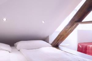 Łóżko lub łóżka w pokoju w obiekcie Hotel Villa Rückert