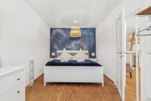 Postel nebo postele na pokoji v ubytování Loft über den Dächern Coburgs, Parkplatz