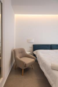 Postel nebo postele na pokoji v ubytování Aura Room