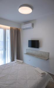 Postel nebo postele na pokoji v ubytování Aura Room