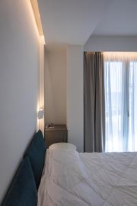 Postel nebo postele na pokoji v ubytování Aura Room