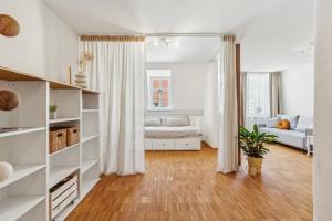Postel nebo postele na pokoji v ubytování Loft über den Dächern Coburgs, Parkplatz