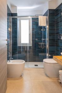 Koupelna v ubytování Aura Room