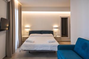 Postel nebo postele na pokoji v ubytování Aura Room