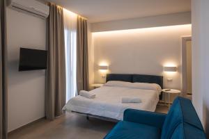 Postel nebo postele na pokoji v ubytování Aura Room