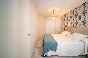 Posteľ alebo postele v izbe v ubytovaní San Clemente House