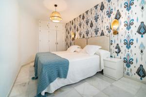 Posteľ alebo postele v izbe v ubytovaní San Clemente House