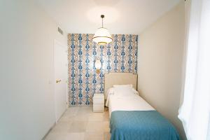 Posteľ alebo postele v izbe v ubytovaní San Clemente House