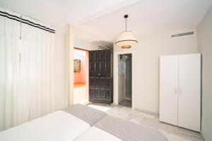 Posteľ alebo postele v izbe v ubytovaní San Clemente House