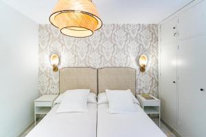 Posteľ alebo postele v izbe v ubytovaní San Clemente House