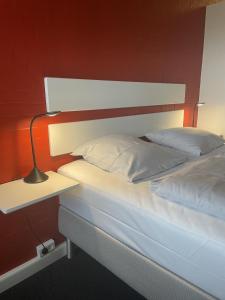 Una cama o camas en una habitación de Motel Rovli