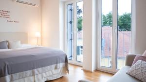 Postel nebo postele na pokoji v ubytování Hotel Villa Rückert