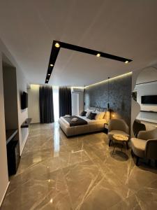 Posezení v ubytování Hotel LEODORI 3 suites