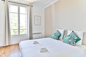 Postel nebo postele na pokoji v ubytování Appartement Spacieux et paisible Magnifique Vue