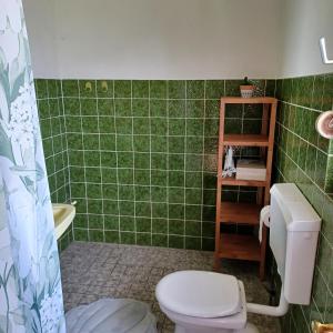 Koupelna v ubytování Ferienhaus mit Meerblick + 25 fotografií