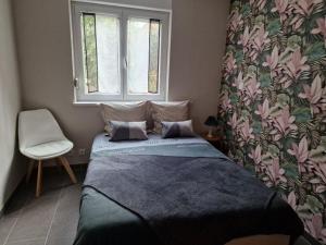 Кровать или кровати в номере Gîte Alsace en vue
