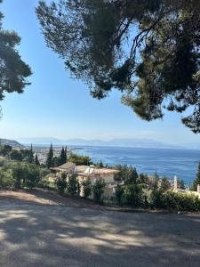 a view of the ocean from a tree at Marble Home in Egira