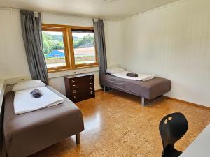 Photo de la galerie de l'établissement Twin room 204 near Kristiansand, à Vennesla