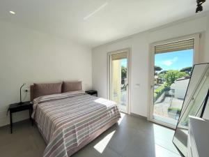 Postel nebo postele na pokoji v ubytování Vittoria Apartament