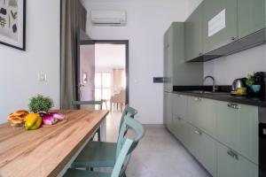 Kuchyň nebo kuchyňský kout v ubytování Ermes by PortofinoHomes