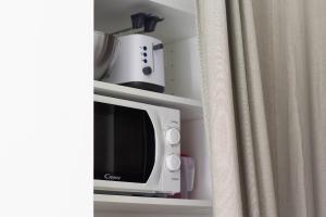 Kuchyň nebo kuchyňský kout v ubytování Ermes by PortofinoHomes