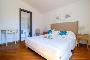 Postel nebo postele na pokoji v ubytování Ermes by PortofinoHomes