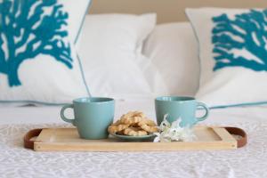 Postel nebo postele na pokoji v ubytování Ermes by PortofinoHomes