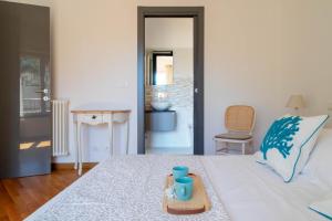 Postel nebo postele na pokoji v ubytování Ermes by PortofinoHomes