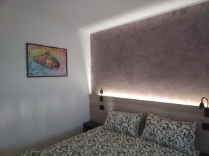 Posteľ alebo postele v izbe v ubytovaní Apartmani Pause