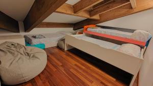 a room with two bunk beds and a couch at Cabirol in Camprodon +7 photos