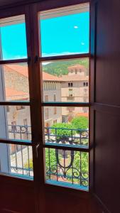 a view out of a window of a building at Cabirol in Camprodon