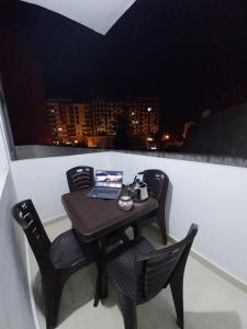 A balcony or terrace at Eftalya Hostel Tanger
