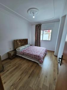 A bed or beds in a room at Eftalya Hostel Tanger