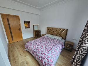 A bed or beds in a room at Eftalya Hostel Tanger