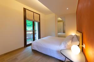 Voodi või voodid majutusasutuse Agriturismo Deviscio toas