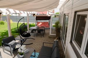 Balkon lub taras w obiekcie Apartament Domek Romi w Augustowie do wynajęcia