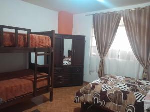 Postel nebo postele na pokoji v ubytování SANPE Apartment