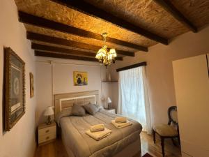 Ένα ή περισσότερα κρεβάτια σε δωμάτιο στο Casa Amparo