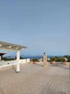 a view of a patio with a roof at Gaia Pia Home in Bacoli