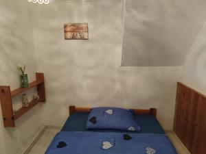 Postel nebo postele na pokoji v ubytování Apartmán Brdy
