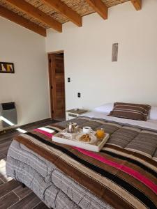 Postel nebo postele na pokoji v ubytování Hotel Pirwa