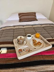 Katil atau katil-katil dalam bilik di Hotel Pirwa