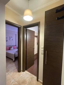 Postel nebo postele na pokoji v ubytování Anesis home
