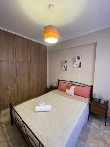 Postel nebo postele na pokoji v ubytování Anesis home