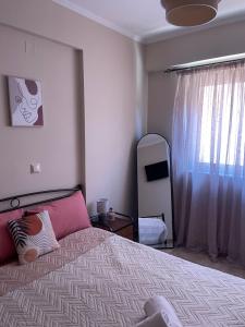 Postel nebo postele na pokoji v ubytování Anesis home