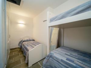 LA FINESTRA SUL MARE - Antonella Apartment客房内的一张或多张床位