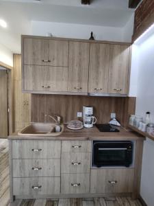 A kitchen or kitchenette at Green House Skiathos