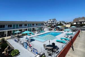 a view of a swimming pool at a hotel at The Jetty Motel in Cape May