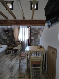 A television and/or entertainment centre at Green House Skiathos