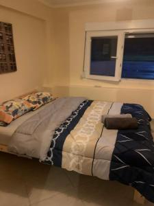Postel nebo postele na pokoji v ubytování RAY APARTMENT